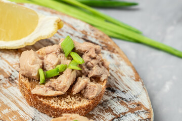 toasts with Cod Liver pate on whole grain bread. Detox and healthy superfoods concept