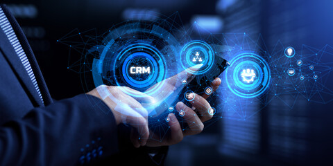 Fototapeta na wymiar CRM Customer relationship management concept. Businessman pressing button on screen.