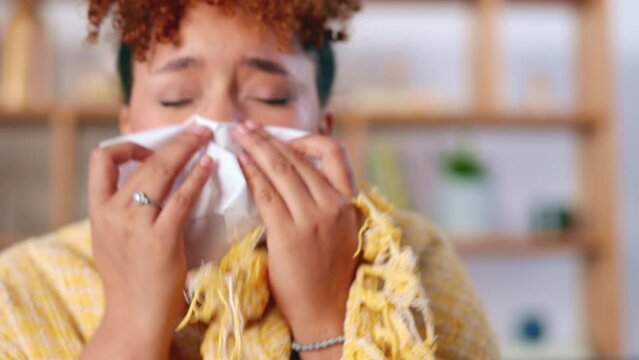 Sick, tissue and woman in living room, sneeze and stress with virus, health and illness. Female, lady and toilet paper with disease, allergy and virus in lounge, blanket or girl blowing nose and sofa