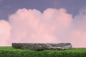 Stone podium tabletop floor in outdoor on sky pink gold pastel soft cloud blur background.Beauty...