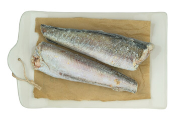 Raw hake isolated on white background. Ready to cooking. Iced Hake Filet.
