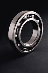 ball bearing on a black background close-up, blur as an artistic device