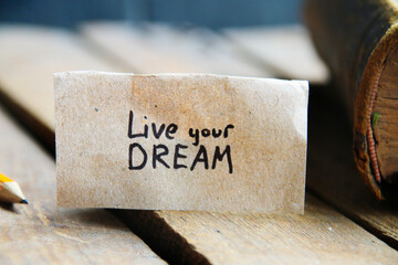 Live your dream. The inscription on the tag. Vintage style. Motivational quotes.