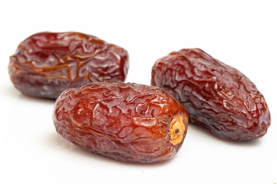 delicious dates isolated on white background. food for breaking fast in Ramadan