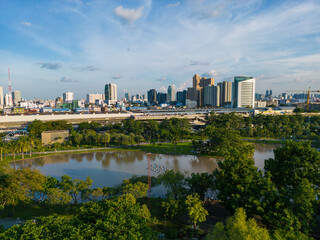 Aerial view green tree park in Chatuchak public park with office building