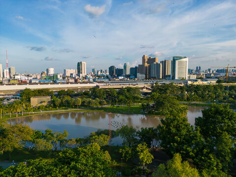 Aerial view green tree park in Chatuchak public park with office building