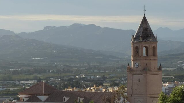 San Juan church tower at sunset , Velez Malaga, Spain