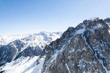 Aerial shot of beautiful snow covered mountain range