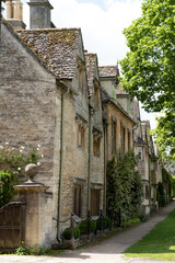 Vertical shot of Quintessential Cotswold village houses in Burford, Oxfordshire, England