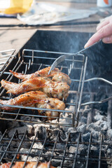 Grilling chicken wings summer rest concept