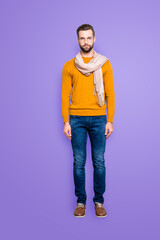Full size fullbody portrait snap of strict dreamy stylist in sweater jeans having scarf around neck looking at camera isolated on grey background