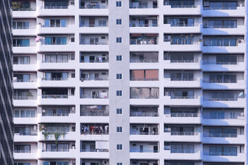 Tall building background, Side of the building with windows and door.