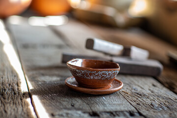 Hands working sculpture on pottery wheel ,making hands shaping a bowl pottery on the spinning,mold, Thailand