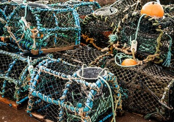 Stack of fishermen lobster pots drying in the harbor