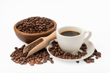 A cup of aromatic espresso coffee isolated on a white background. Coffee beans in a cup. Energy drink. A refreshing aromatic morning drink.