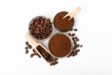 Bowl of ground coffee and beans isolated on a white background.