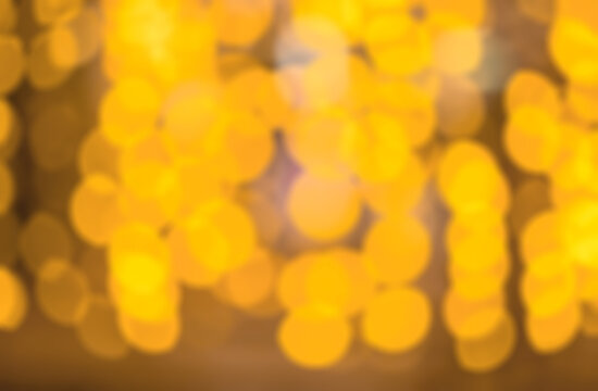yellow light bokeh for background, Colorful abstract facula, blurry circles, abstract background. Blur out lots of yellow bokeh for the background for any media advertisement.