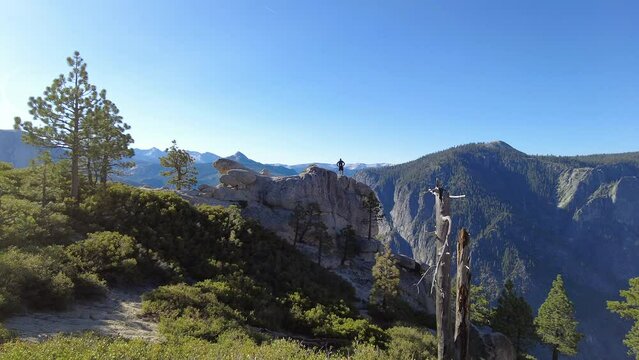 Man Takes in the View at Yosemite Point over Yosemite Valley