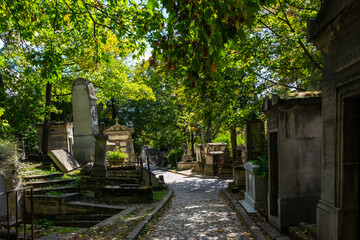 Paris, France, Oct 2022, view of an alley in the Père Lachaise cemetery  - 583951589
