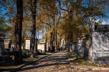 Paris, France, Oct 2022, view of an alley in the Père Lachaise cemetery  - 583951596