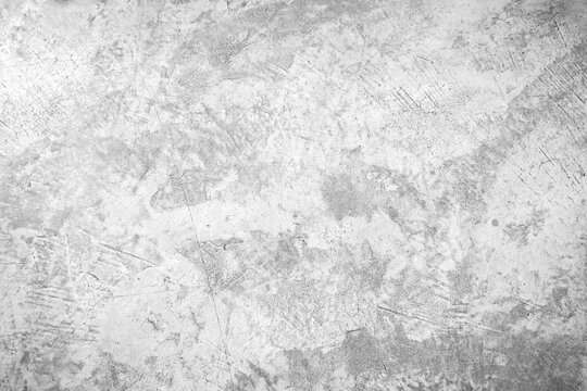 black and white texture white grunge cement or painted concrete wall White plastered stucco wall. Cement stone paint. Cracked cement wall. Abstract gray concrete texture background.