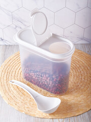 Organization of food storage in the kitchen, transparent reusable jars for cereals, coffee, sugar and pasta