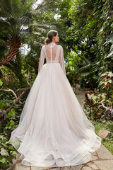 Sexy beautiful woman pretty bride wedding big day marriage ceremony in summer garden wearing long silk and lace white dress bright makeup hairstyle pure love.