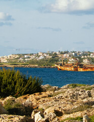 Fototapeta na wymiar Wreck of Edro III ship on a sea coast. Coral Bay Cyprus.