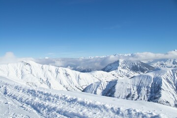 Fototapeta na wymiar Aerial view of snow covered mountain landscape