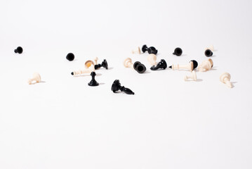 Chess on white background, studio shooting.  Chess pawns.