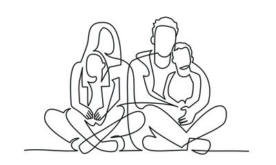 Mother, father, son, daughter sitting on the floor and hugging.
