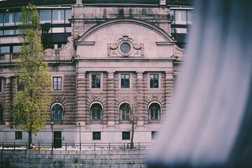 Facade of the Parliament House of Stockholm, Sweden with blur foreground