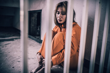 Portrait of women desperate to catch the iron prison,prisoner concept,thailand people,Hope to be...