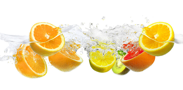 Fruits mix splashing into clear water on a white background