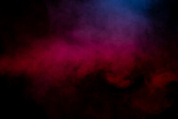 Fototapeta premium Purple and blue steam on a black background.