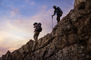 rock climber silhouette .  climber on the top of mountain. 