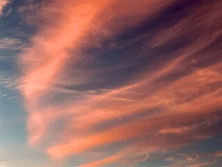 Blue sky with red clouds at sunset