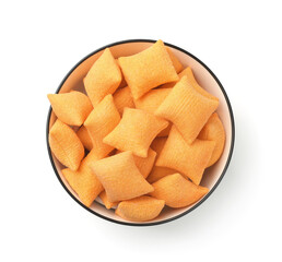 Top view of wheat cereal pillows in ceramic bowl