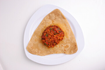 Paratha with vegetables in a plate, indian food 