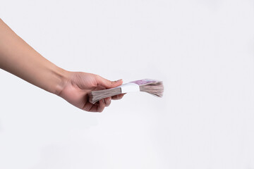 hands holding money isolated on white background