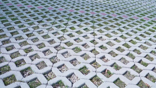 Texture of the diamond-shaped floor of a parking lot