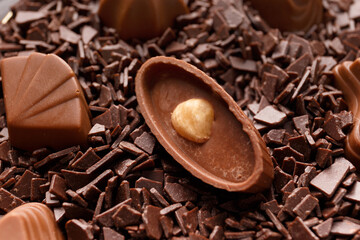 Candies in chocolate chips close-up macro photography.