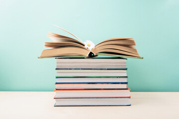 World book and Copyright day, Education concept on Blue Mint Background.