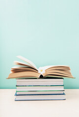 World book and Copyright day, Education concept on Blue Mint Background.