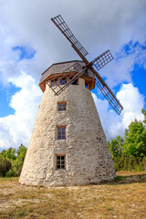 Fototapeta na wymiar An old windmill in Hiiumaa, Estonia. Summer and sun.