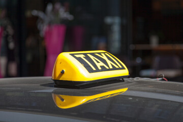 Yellow Austrian taxi sign