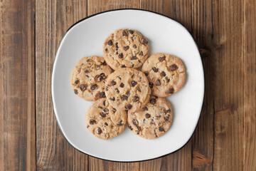 Chocolate chip cookies on rustic wood