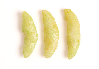 Thin Green Wasabi Rice Crackers on a White Background