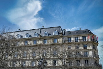 Fototapeta na wymiar Paris, ancient buildings, typical parisian facades