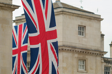 Fototapeta na wymiar Huge flags of England near the Horse Guards building in London UK